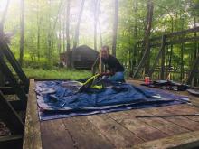 Kathleen setting up her tent at the Welch Trail Education Center. Photo by Kathleen Bezik.